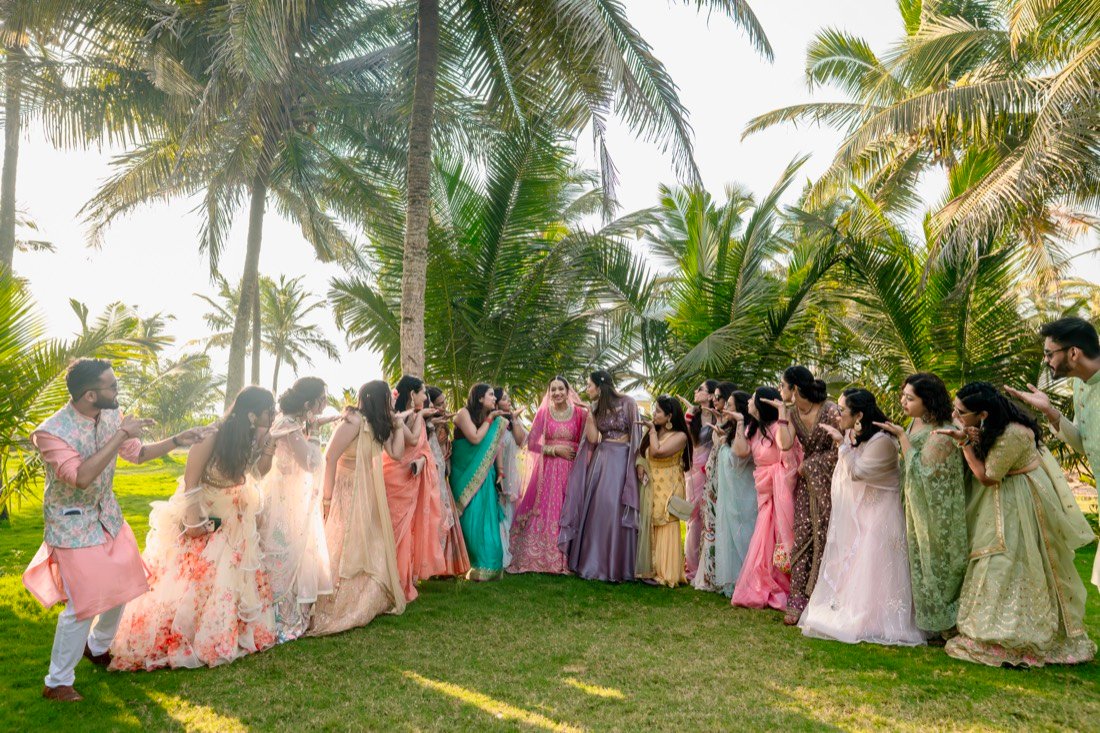 Saumya with her friends under the palms