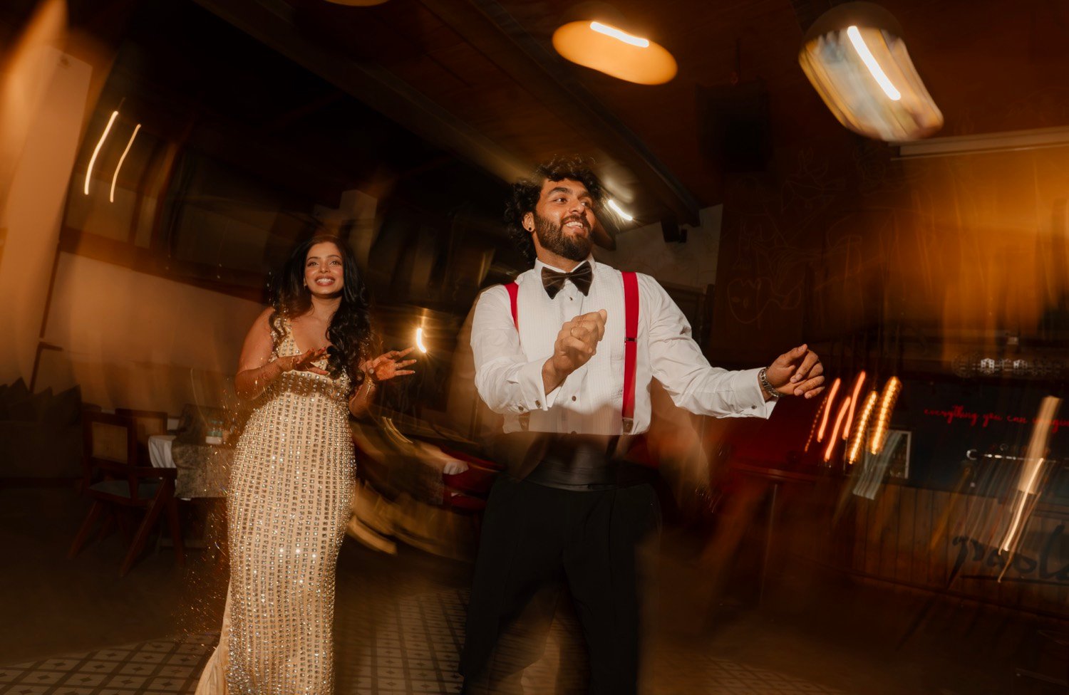 Dancing together, red suspenders and all
